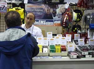 Photo Rick Markley
Ron Sigismonti greets customers to the EMS Store booth at FDIC.
