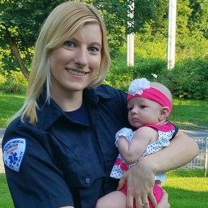 Pictured is paramedic Dani Kamenar and her daughter, Brooklyn.