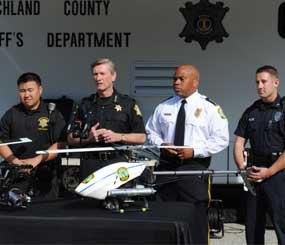 Sheriff Leon Lott, Deputy Kim, Columbia Police Chief Randy Scott, and Columbia Police Officer Brice, at a press event announcing the “Aerial Intelligence and Response” program in South Carolina. (Image Courtesy of Richland County Sheriff's Department)  