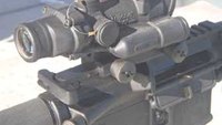 SHOT Show 2012: Looking through the Trijicon AA-battery-operated ACOG TA02