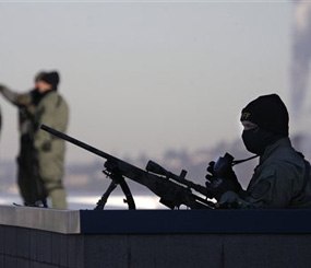 Anyone in harm’s way should be evacuated and a sniper/observer team with optics should be set up in a location to observe, gather intelligence, and provide a protective overwatch. (AP Photo)