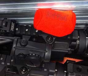 Scopecoat products are constructed using high-quality Neoprene cores of various thicknesses, then laminated with Nylon. The Neoprene draws moisture and condensation away from the scope to help protect it from the elements as well as providing a protective cushion.
