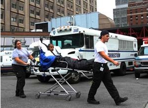 AP Photo
A patient is seen being evacuated from Bellevue Hospital in New York on Oct. 31. About 500 patients were evacuated in total due to storm damage.