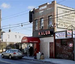 Detectives are seen outside of Kalua Cabaret, a strip club in the Queens where Sean Bell was shot.