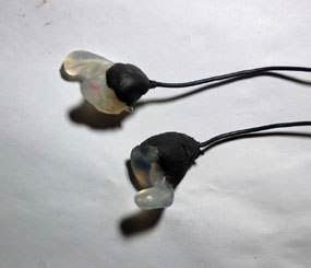Because it’s so easy to work with, hobbyists have been finding all sorts of applications for Sugru. I improved on the custom earpieces I had made for my Shure headset by using a bit of sugru to hold the earbuds inside the silicone earpieces.