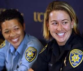 Lisa Campbell, manager of the University of California Police Department Special Events, left, and UC Berkeley police officer Ally Jacobs recall their interaction with kidnapping suspect Phillip Craig Garrido at a news conference in Berkeley, Calif., on Friday, Aug. 28, 2009.