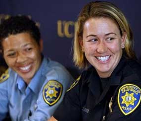 Lisa Campbell, manager of the University of California Police Department Special Events, left, and UC Berkeley police officer Ally Jacobs recall their interaction with kidnapping suspect Phillip Craig Garrido at a news conference in Berkeley, Calif., on Friday, Aug. 28, 2009. (AP Photo/San Francisco Chronicle, Paul Chinn)