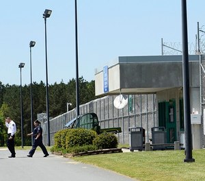Prison officials enter and exit Lanesboro Correctional Institution in Polkton, N.C. (John D. Simmons/Charlotte Observer/TNS)