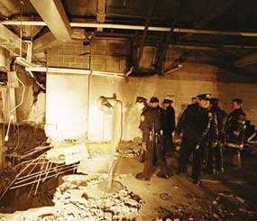 In this file photo of Feb. 27, 1993, police and firefighters inspect the bomb creater inside an underground parking garage of New York's World Trade Center the day after an explosion tore through it. Twenty years ago next week, a group of terrorists blew up explosives under one of the towers, killing six people and ushering in an era of terrorism on American soil.