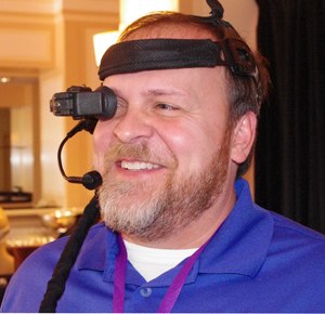Ken Shrum of Impact Instrumentation demonstrating the E.L.A.D. headset (Image Dan White)