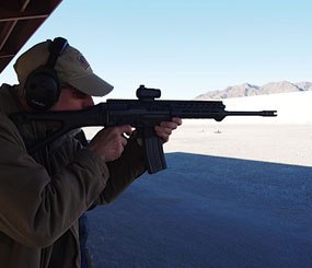 Editor in Chief Doug Wyllie is pictured with the new SIG556xi rifle.