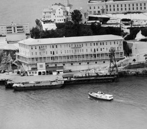 In this June 12, 1962, file photo, Alcatraz Federal Penitentiary in San Francisco Bay is shown the day three prisoners escaped.