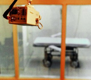 This July 29, 1997, file photo, shows the Department of Correction death chamber in Varner, Ark., with a closed-circuit television camera mounted nearby. The agency in April 2017 will attempt to conduct four double-executions in a 10-day period after not executing anyone 2005.