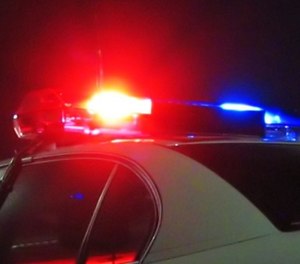 Joseph Rettig, 42, has been suspended without pay following an incident in which police say he crashed his Chevrolet Trailblazer into two parked cars.