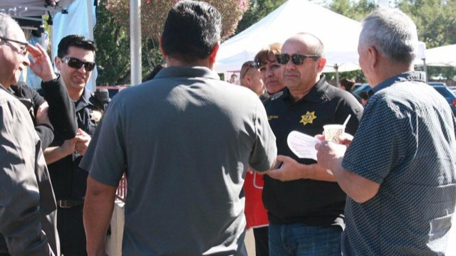 Sheriff Bolanos meets with community members during a Coffee with a Cop event.