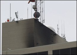 The charred wall near the helipad atop Spectrum Health Butterworth Hospital is shown in Grand Rapids, Mich., May 29, 2008. A medical helicopter crashed on the roof of the hospital, catching fire moments after the two people on board escaped with minor injuries, a fire official said. (AP Photo/Jim Harrington)
