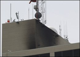 The charred wall near the helipad atop Spectrum Health Butterworth Hospital is shown in Grand Rapids, Mich., May 29, 2008. A medical helicopter crashed on the roof of the hospital, catching fire moments after the two people on board escaped with minor injuries, a fire official said. (AP Photo/Jim Harrington)