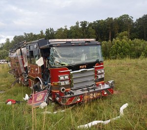 A Pinecroft Sedgefield Fire Department engine rolled over Tuesday night when it swerved to avoid a vehicle that had slowed abruptly in front of it. (Photo/Pinecroft Sedgefield Fire Department Facebook)
