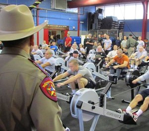 Texas Dept. of Public Safety recruits complete a physical fitness test at the police academy.