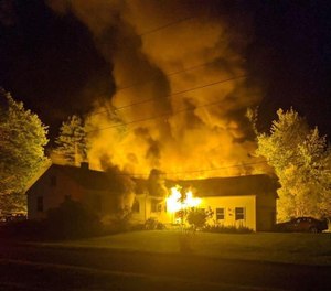 Five firefighters sustained minor injuries battling an