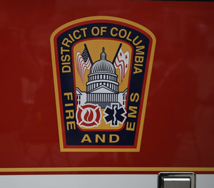 A member of D.C. Fire and EMS was shot as he tended to a shooting victim early Sunday morning.