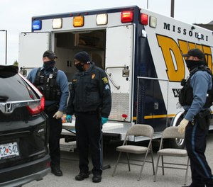 Kansas City, Mo., has removed its mask exemption for first responders and other essential workers. The city's police department recently saw an outbreak of the virus that left 18 officers out sick and 54 in quarantine.