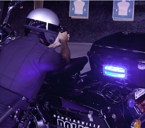 Live-fire training has evolved to use props like motorcycles to offer a more realistic training experience. (image/Meggitt Training Systems)