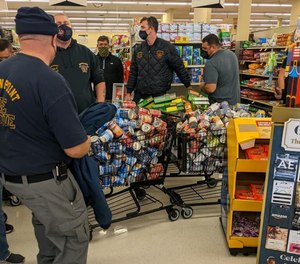 Crown Point Fire Rescue Chief Dave Crane was contacted to round up as many helping hands as he could to head to the local Jewel-Osco and Strack & Van Til on Broadway for a