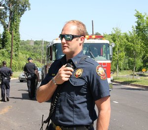 Atlanta Fire Capt. Daniel Dwyer has been suspended for four days without pay after going into a burning house alone to rescue a 95-year-old woman in June.