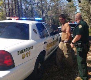 A wild string of events, including a stunning contortionist act straight out of an action movie, landed a Texas man in a Florida Panhandle jail on a slew of felony charges. (Photo/Walton County Sheriff)