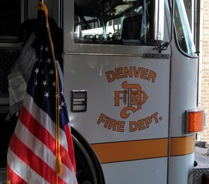 The city of Denver will pay $100,000 to a firefighter who was secretly filmed by a a former lieutenant who placed a hidden camera in her bedroom.