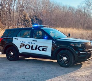 Carbondale police officers were praised for transporting a shooting victim in a pickup truck and performing CPR in the bed of the truck en route to the hospital.