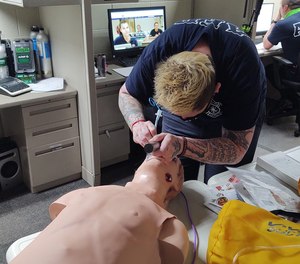 Paramedic Erika Kostichka completes airway training at AFD.
