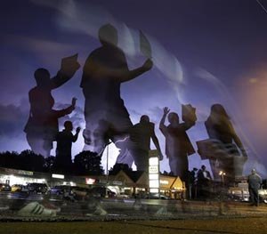 It's a reasonable contention that if he had been wearing a body camera — and that video was examined by agency leadership and released responsibly to the public — Ferguson would probably have been spared the violence and unrest. (AP Image)
