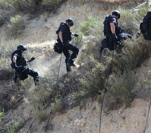 Members of the LAPD SWAT team in a training session on April 26, 2015.