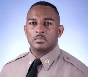 Maj. Ricky Carter was injured after crashing into a guardrail on a highway.