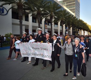 Anaheim Fire & Rescue officials and members of the Phoenix Society participate in a remembrance walk at the Anaheim Convention Center on Wednesday, Oct. 2. (Photo/Steven Georges/Behind the Badge)