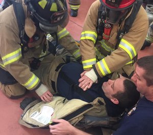 This photo shows Dalton firefighters training to perform CPR on a downed firefighter. The Dalton Fire Department hopes to have all 85 firefighters certified as EMTs by 2023.