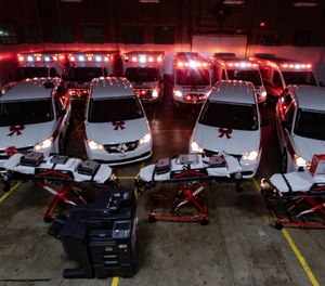 The owners of Spirit Medical Transport, LLC surprised employees with 10 new vehicles, three new power cots, four new patient ventilators, two new copiers, seven new computers and more at the service's annual Christmas party this past weekend.