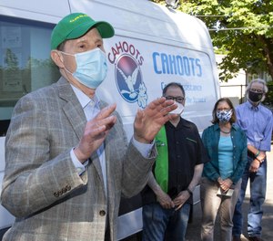 Eugene, Oregon's CAHOOTS program, which sends behavioral health workers to mental health emergency calls instead of police, has inspired a push for federal funding for similar programs in other communities. Sen. Ron Wyden (left) is sponsoring the Cahoots Act in Congress.