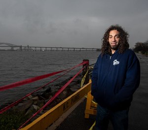New Jersey Lifeguard Anthony Capuano is being hailed as a hero after rescuing a man from a sinking vehicle in the Newark Bay while off-duty.