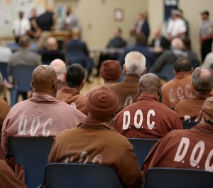Inmates at the State Correctional Institution in Dallas, Pa., during an October 2019 meeting with the state's lieutenant governor. Inmate Edgar Gearhart was fatally stabbed in his cell at the facility earlier this year.