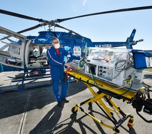 Respiratory Therapist Peter Mrgich talks about an infant isolation incubator that is part of the equipment available for the new Kids Kare helicopter from Wolfson Children's Hospital.
