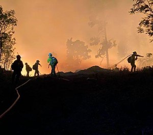 Firefighters participating in a night burnout operation on the Bighorn Fire in Arizona. (Photo/David Melendez)