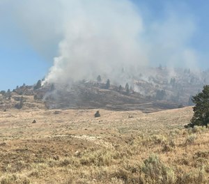 Fourteen wildland firefighters in Washington have been quarantined after serving in close contact with another firefighter who tested positive while battling a nearly 2,000-acre blaze. (Photo/Northeast Region-Department of National Resources)