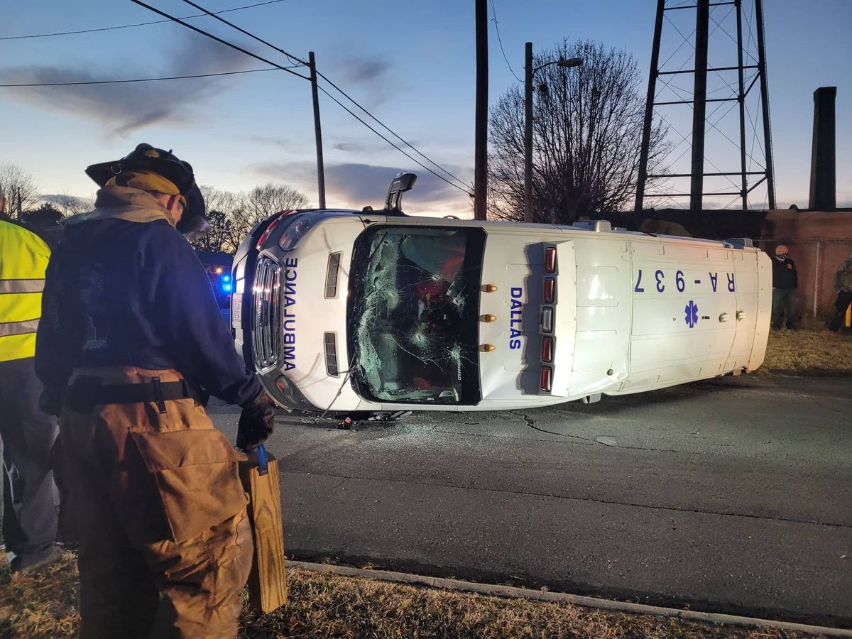 NC ambulance toppled in collision with truck