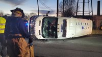 NC ambulance toppled in collision with truck