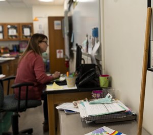Fourth-grade teacher Kim Kates instructs via Zoom from her classroom in Spencer, Mass. The Professional Fire Fighters of Massachusetts, Massachusetts Teachers Association and American Federation of Teachers Massachusetts are asking the state to allow first responders to be deployed to schools to vaccinate school employees.