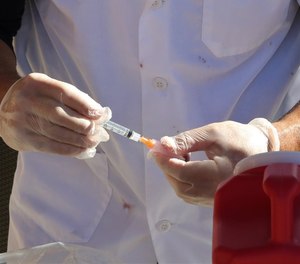 Doña Ana County plans to move forward with mandating COVID-19 vaccines for county employees, including all paid county first responders, despite concerns from labor unions and threats of litigation.