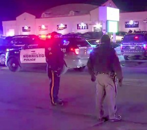 Police in East Norriton, Pennsylvania, respond to a shooting at a bowling alley that left one dead and three others injured.